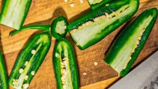 five japapeno peppers cut in half