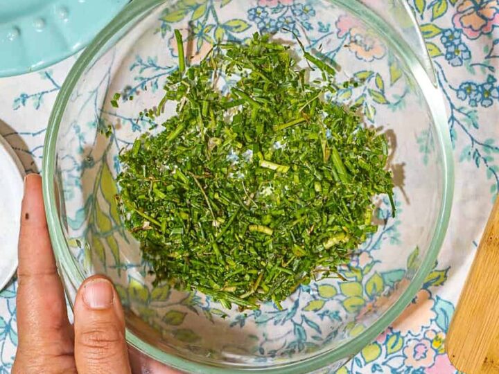 bowl of chopped field garlic greens